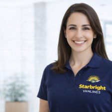 Starbright Vanlines team members smiling and wearing branded polo shirts